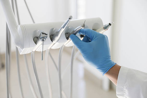Professional Emergency Dentist technician working in Bath, MI